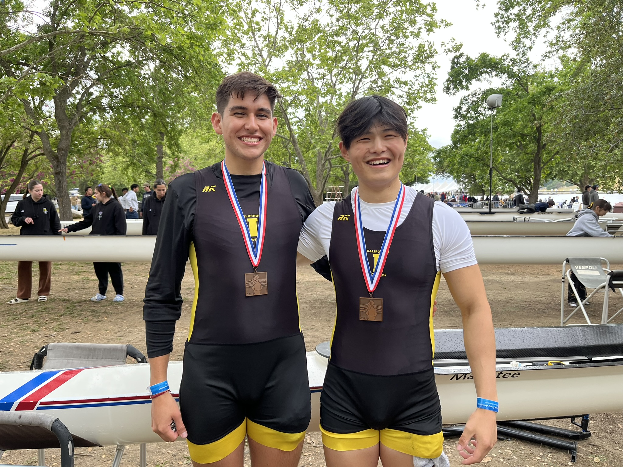 UCI rowing teammates celebrating after competition